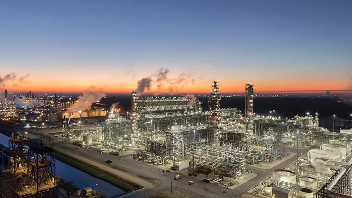 A photo of a Chevron Phillips Chemical plant at night.