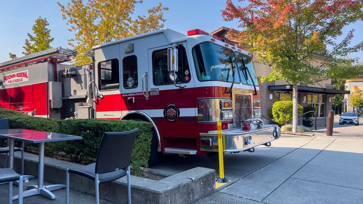 Firefighter truck parked at curb
