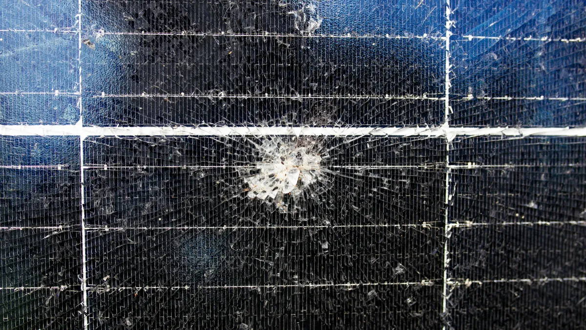 Broken and destroyed solar panel.