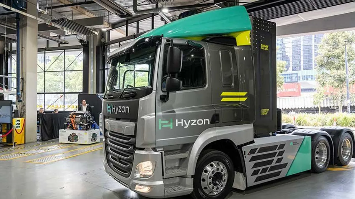 A Hyzon 200 kilowatt fuel system truck in an indoor area.