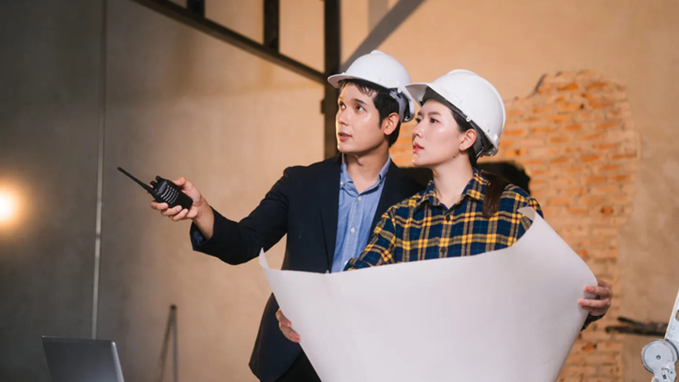 Contractors discuss a potential bid.