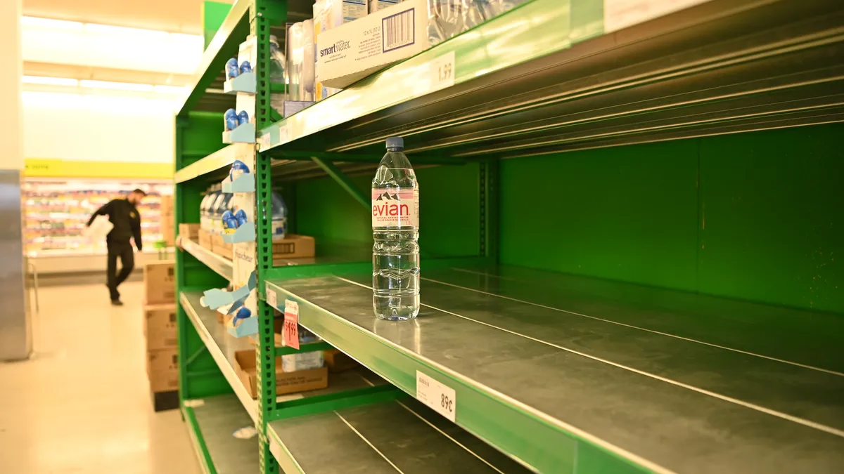 Shoppers just about cleared the shelves of bottled water at this Toronto grocery store. Taken on March 15, 2020.