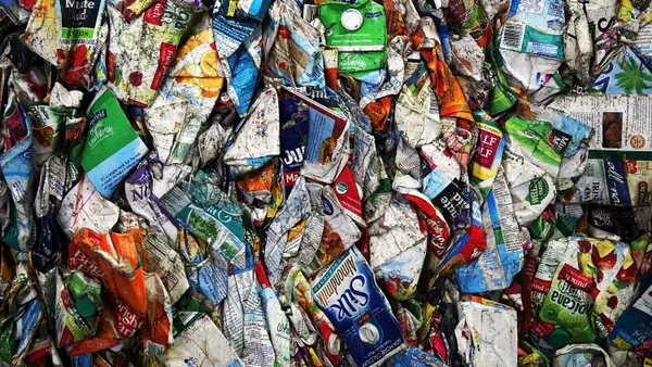 a close up of a bale of recycled cartons