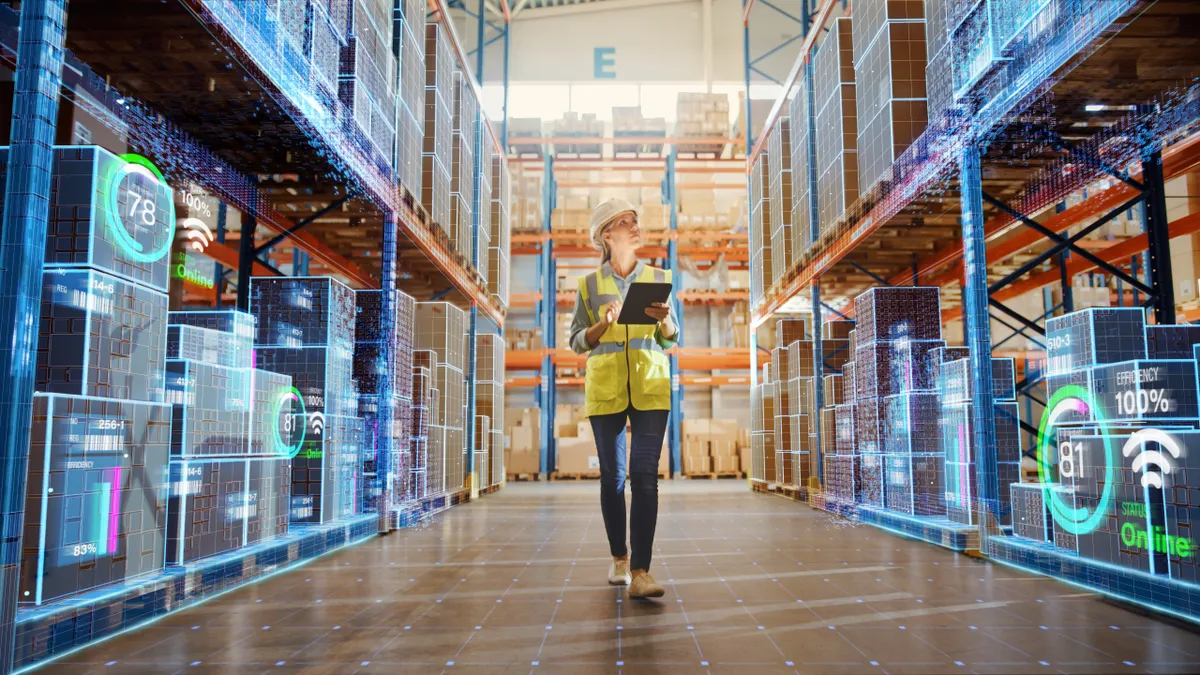 Futuristic Technology Retail Warehouse: Worker Doing Inventory Walks when Digitalization Process Analyzes Goods