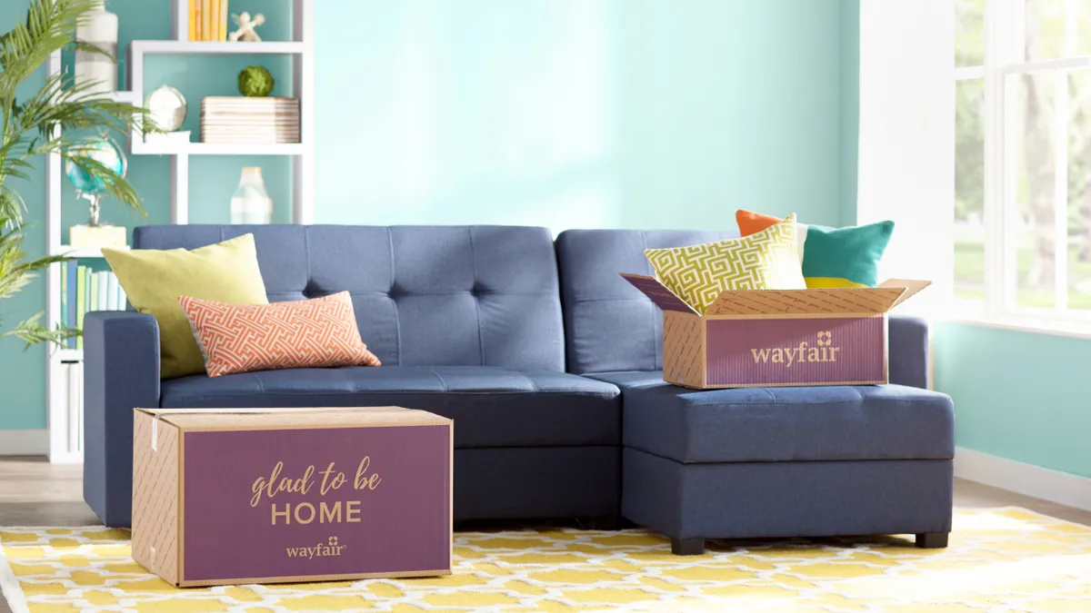 Wayfair boxes in front of a sofa