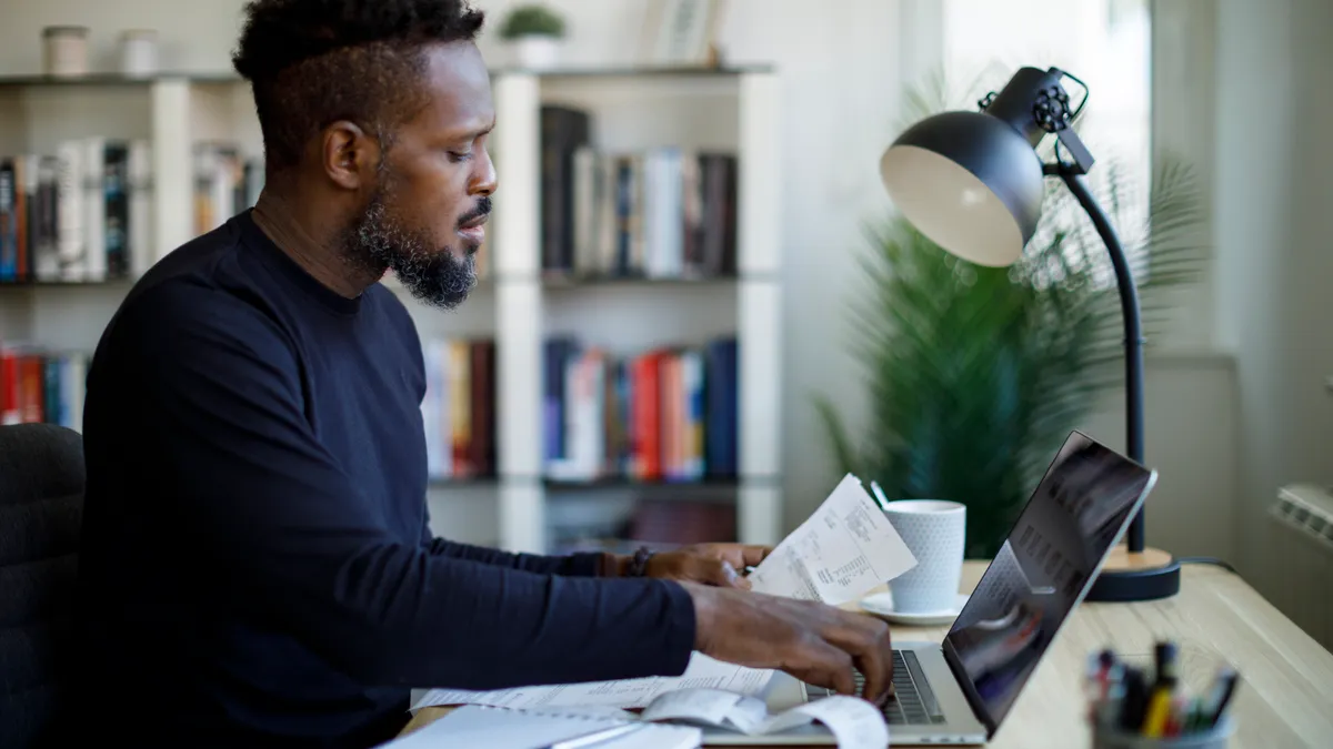 Man calculating budget and finances