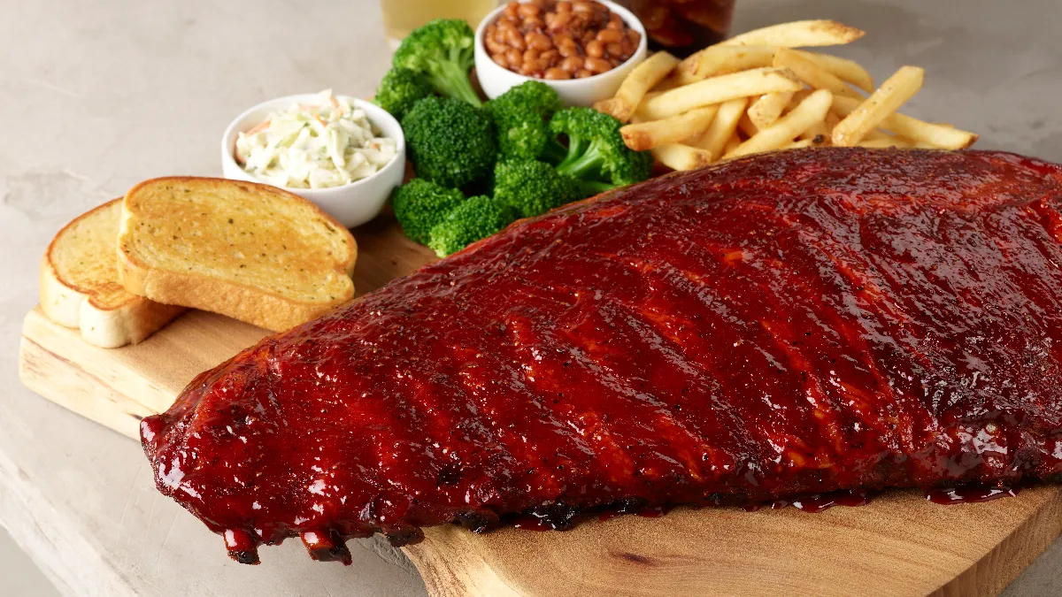 A picture of ribs on a cutting board