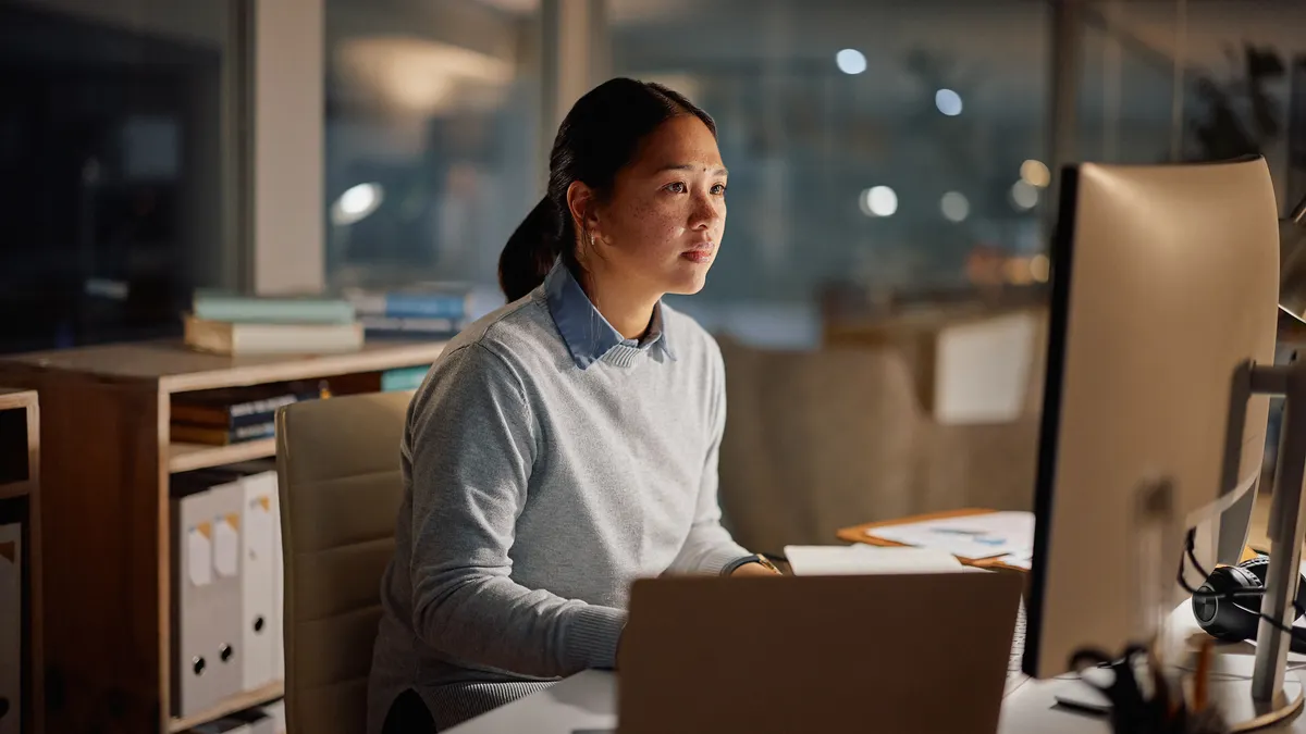 businesswoman, laptop and office at night for working