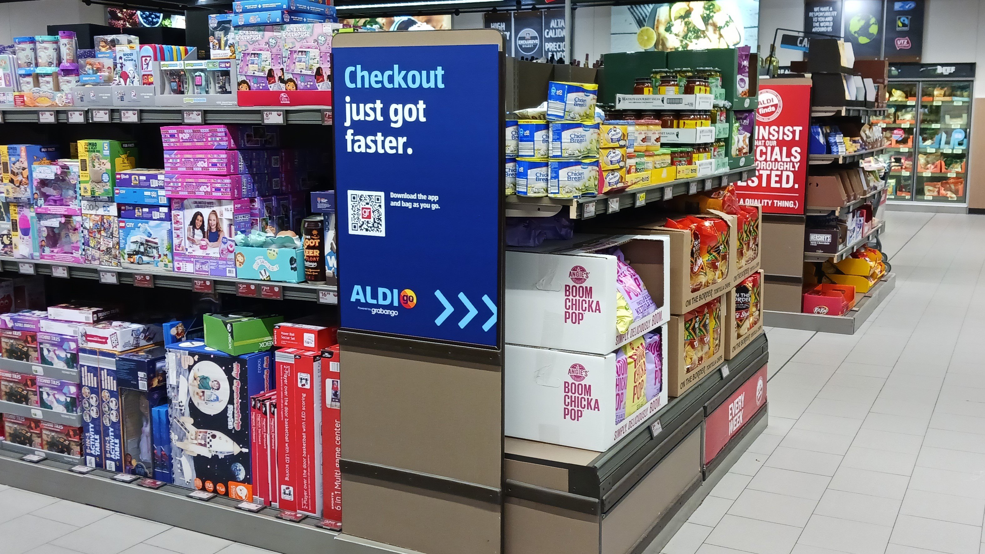 Sign about checkout technology inside grocery store