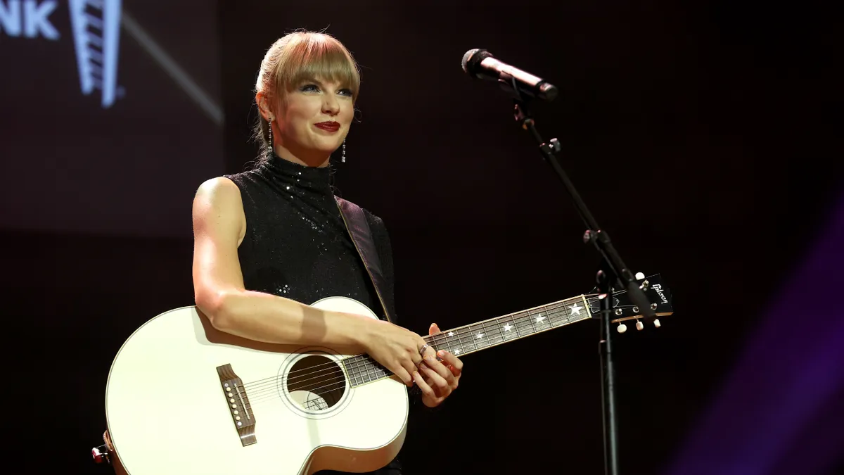 Taylor Swift performs onstage during NSAI 2022 Nashville Songwriter Awards at Ryman Auditorium on September 20, 2022 in Nashville, Tennessee.