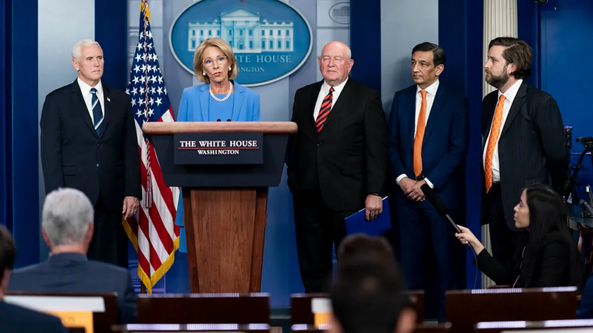 U.S. Secretary of Education Betsy DeVos speaks at a press briefing with Trump administration officials.