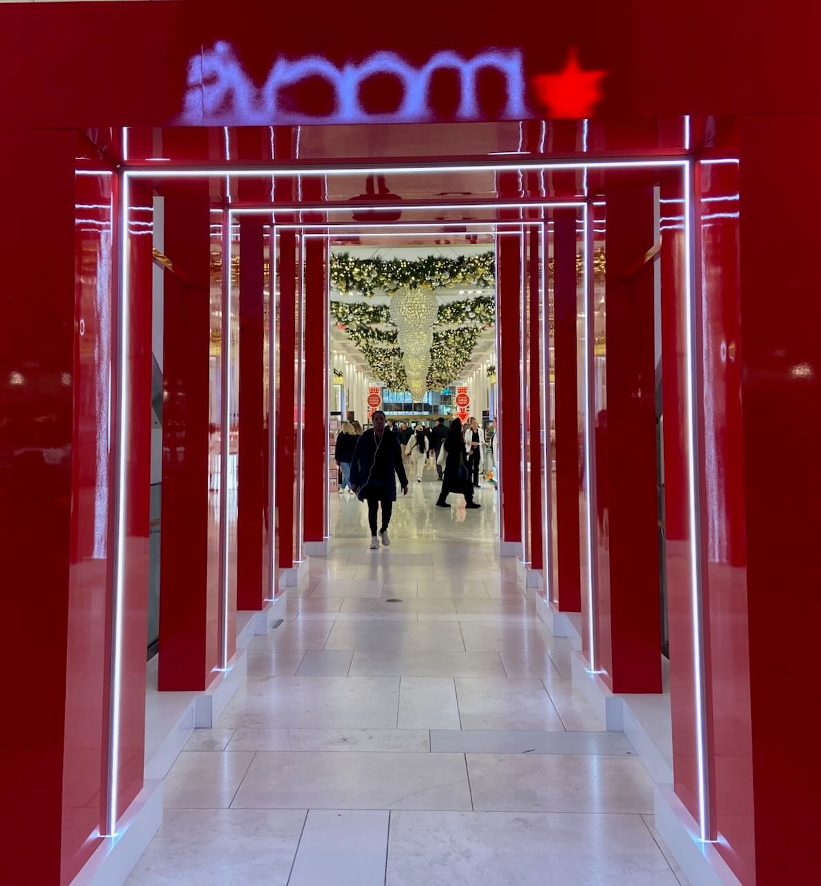 A red walkway inside a store.