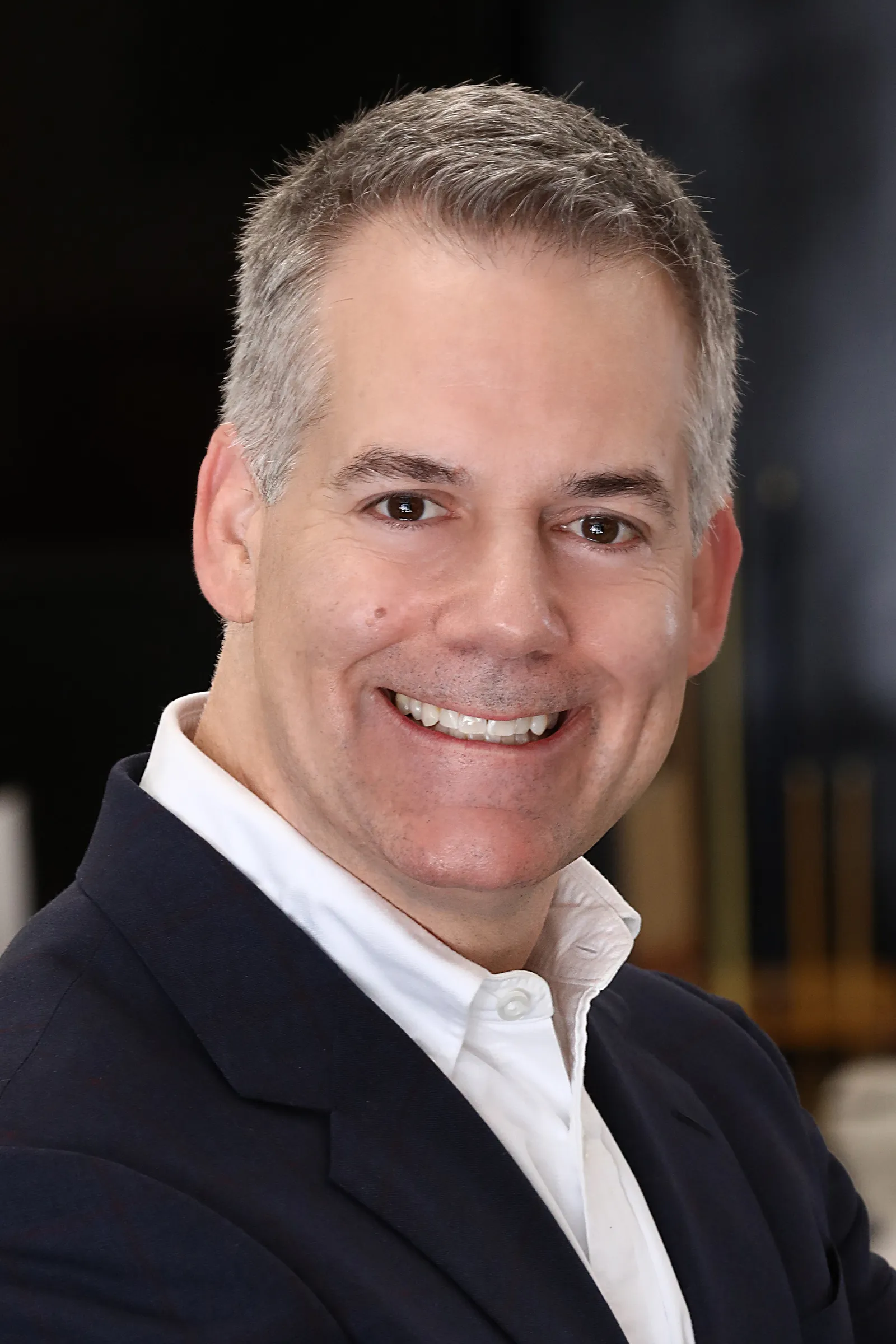 headshot of Stephen Welles, chief legal officer of Denodo