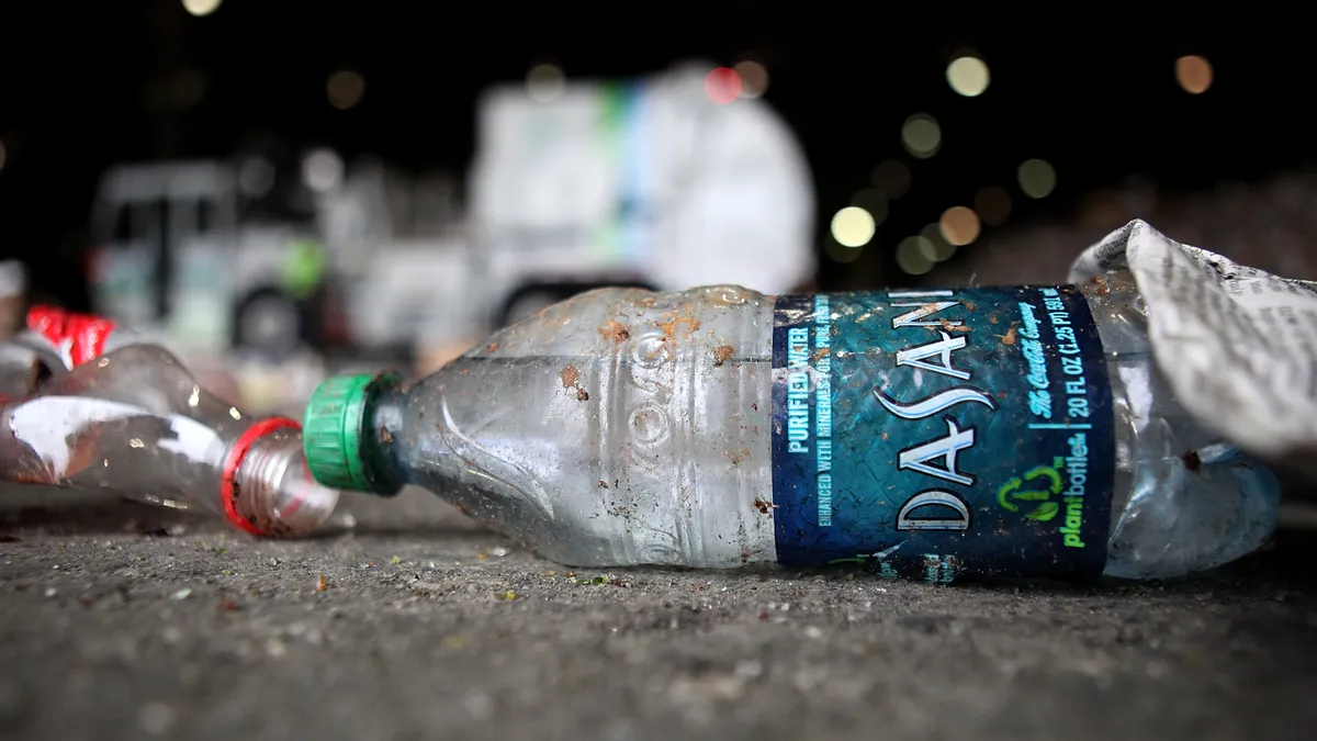 Plastic bottle on floor of recycling facility