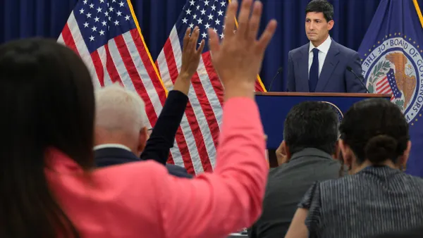 Federal Reserve Board Chairman Kevin Warsh departs his first news conference since taking the helm at the central bank on June 17, 2026 in Washington, DC.