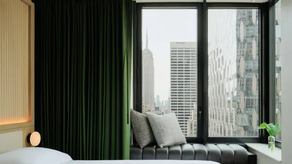 Inside of a hotel room with a large window