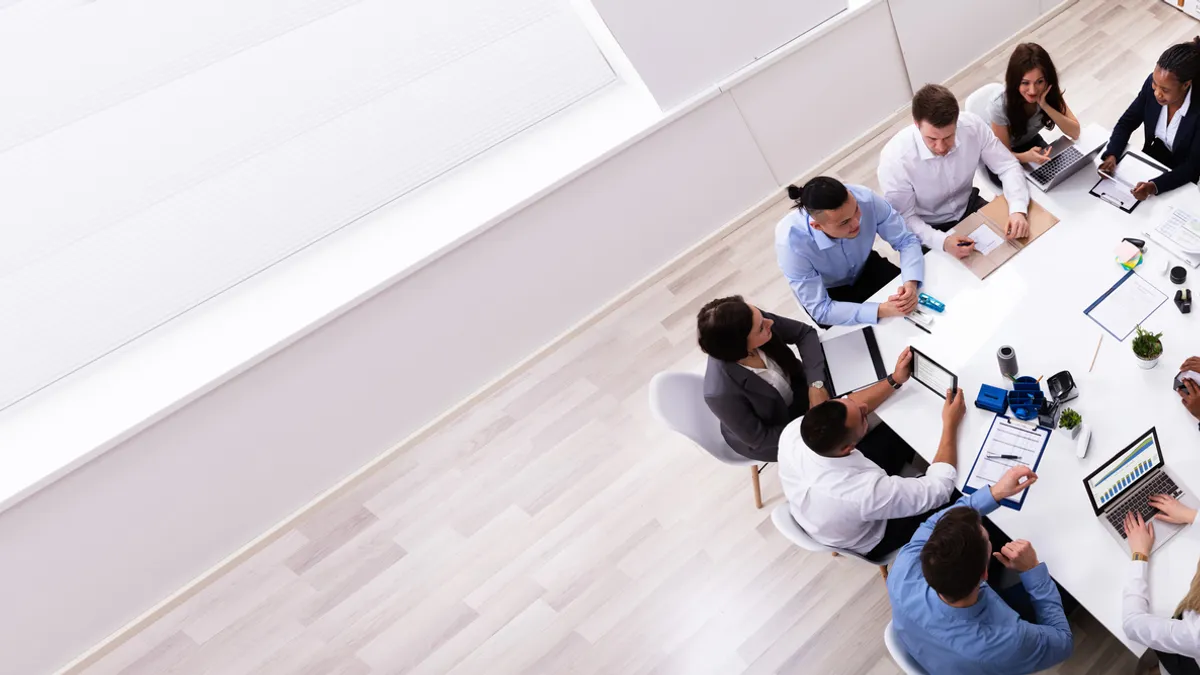 Group of employees at a table