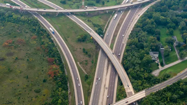 Traffic shown from an overhead view of major interstate exchanges.