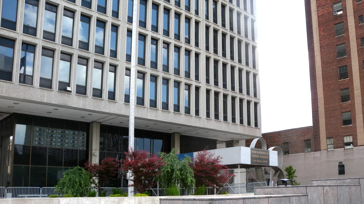 Looking south from Walnut Street is the Peter W. Rodino Federal Office Building at 940 Broad Street in the Newark government center in New Jersey on a mostly sunny midday.