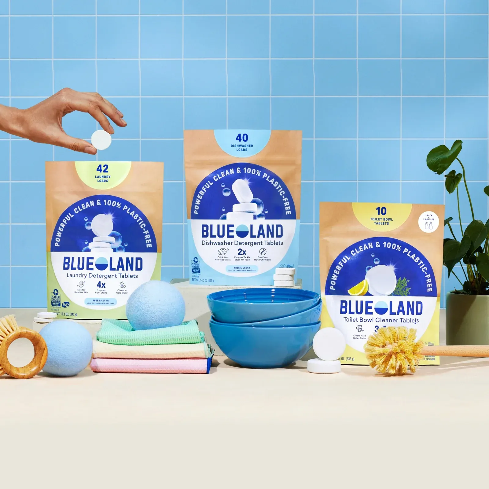 Three pouches of household cleaning tablets with Blueland branding on the front.