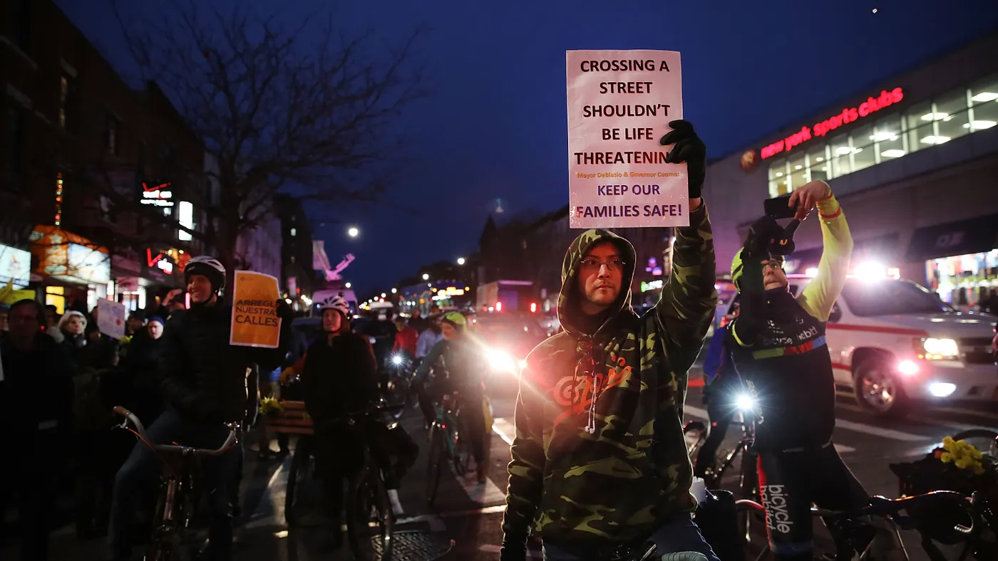 Many people at night protesting in favor of safer streets.