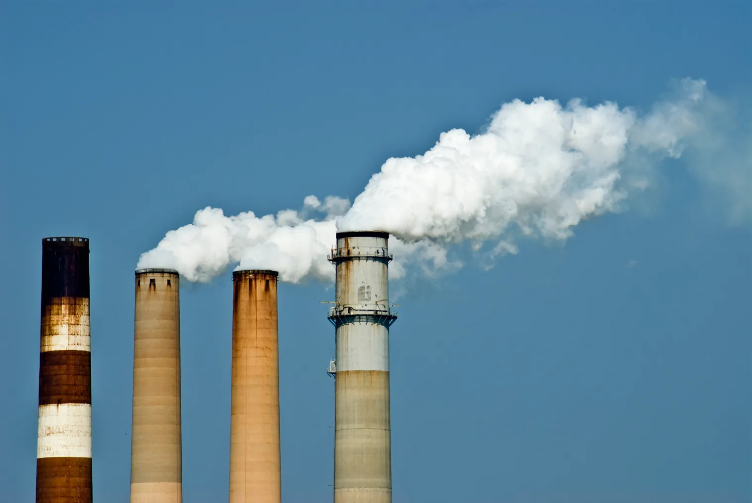 Smoke streaming from the smokestacks of the TECO Big Bend coal-fired power plant in Apollo Beach, Florida