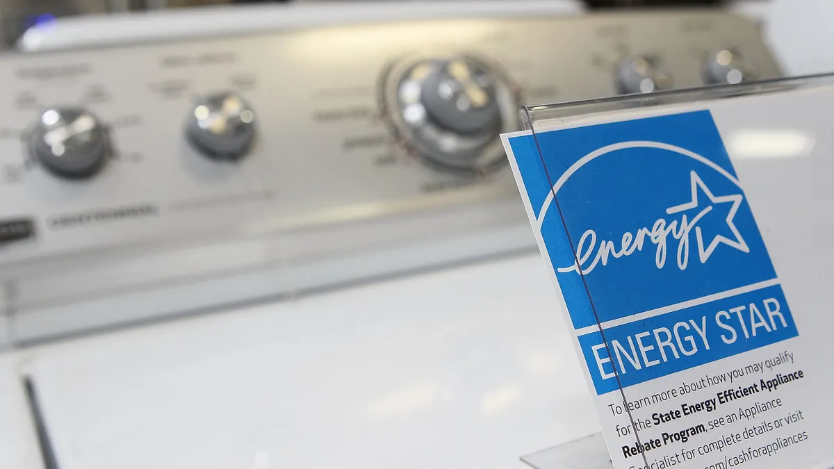An Energy Star label on a washing machine.