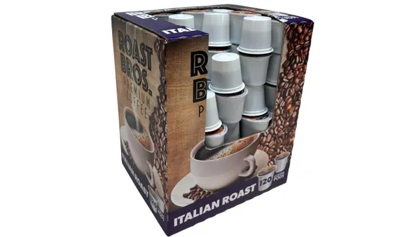 A box with a top and side opening contains stacked coffee pods.