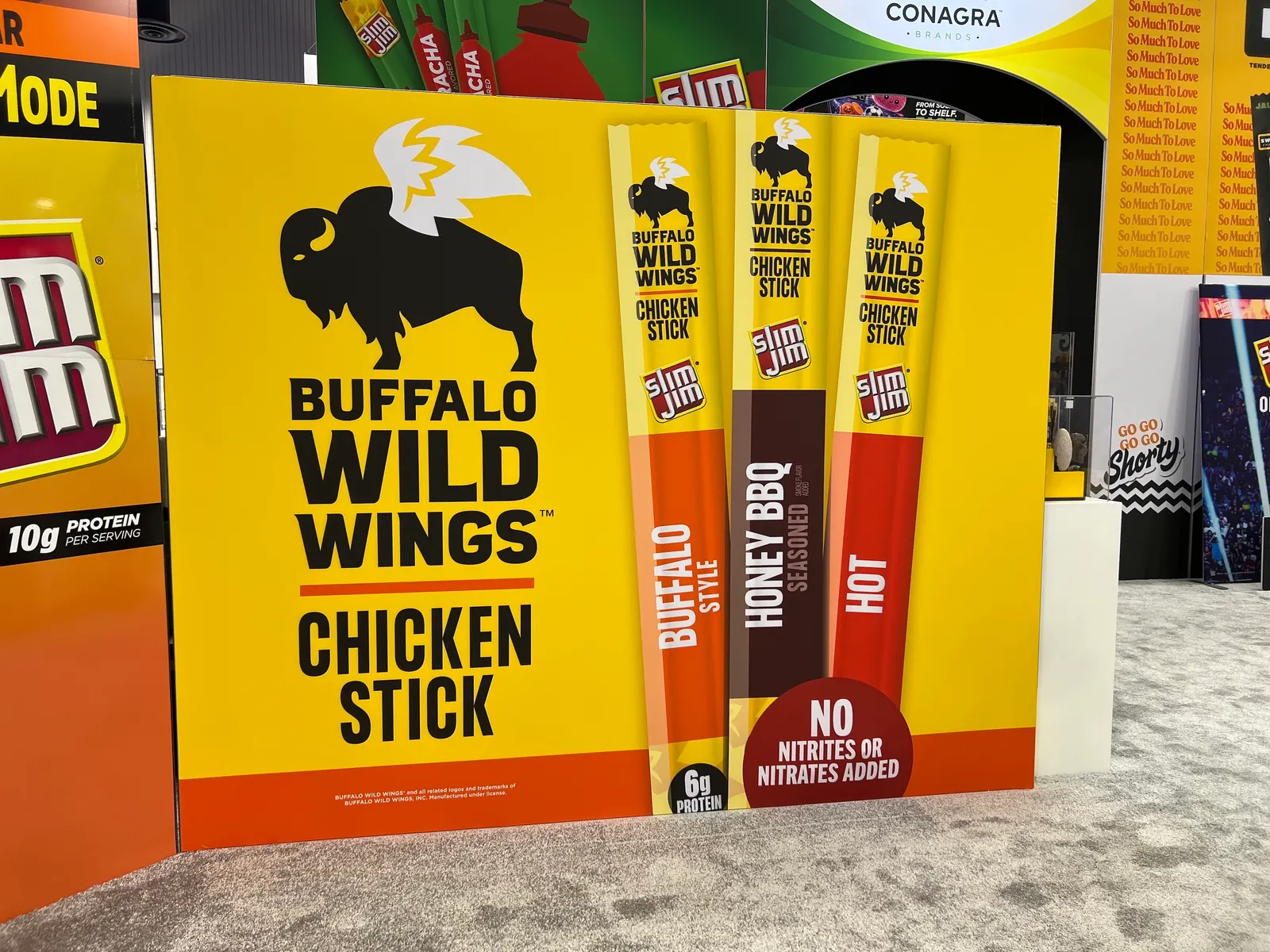 A sign at the 2026 NACS Show promoting Slim Jim meat sticks co-branded with Buffalo Wild Wings.
