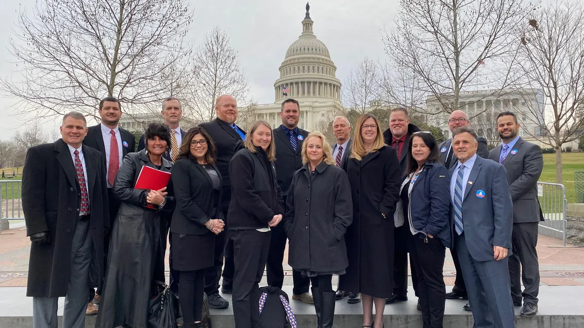 Members of the Principals' Recovery Network stand before Congress, where they spent the day meeting with their representatives and sharing their stories as school shooting survivors.