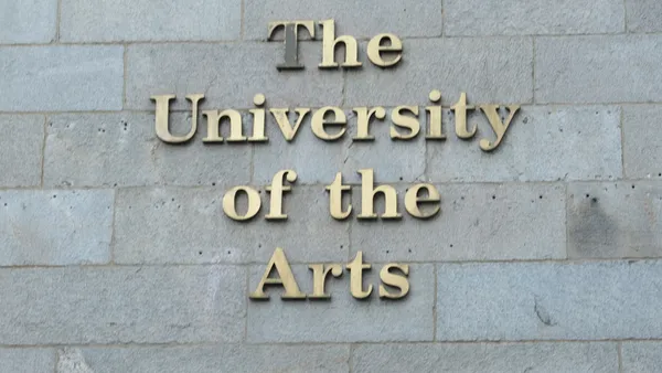 University of the Arts sign on campus in brass lettering.