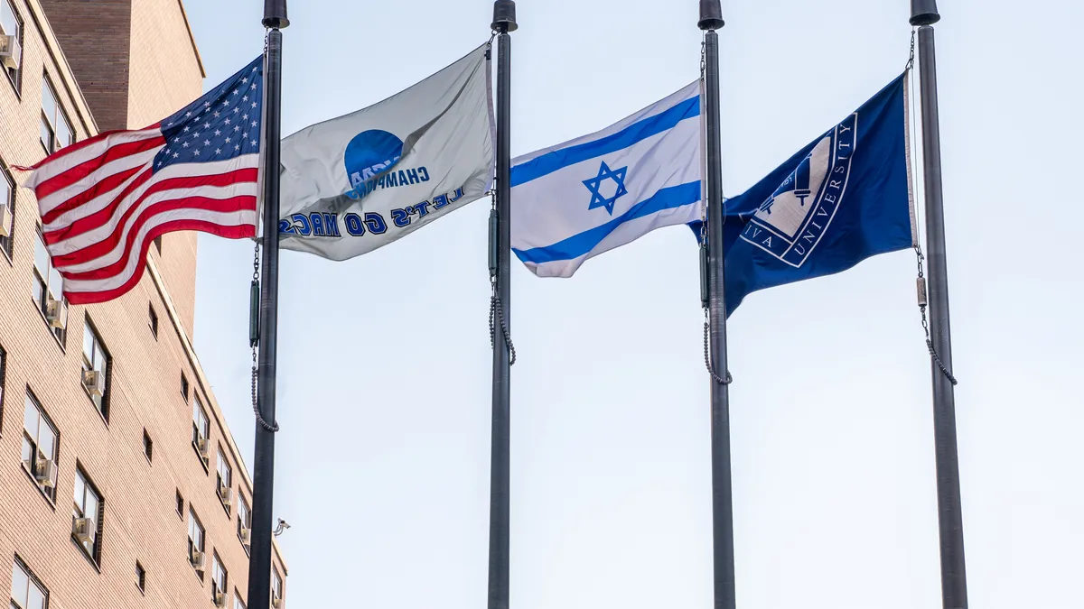 Flags wave in the wind.