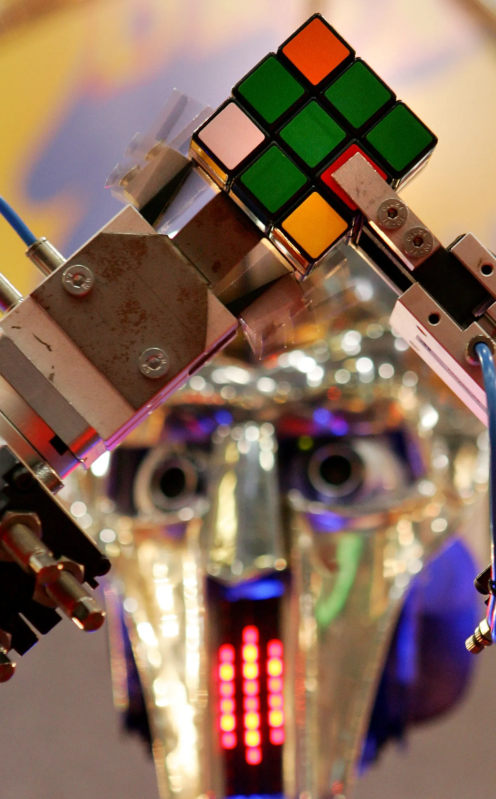 A robot solving a Rubik's cube puzzle.