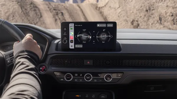 The infotainment screen in a Honda CR-V TrailSport showing a graphic with pitch and roll data.