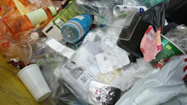 Close-up of plastic packaging in the trash