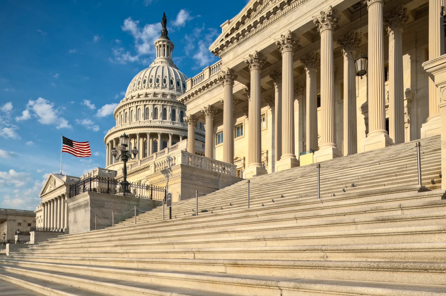 Detail view of the US Capitol east facade in the early morning sun.