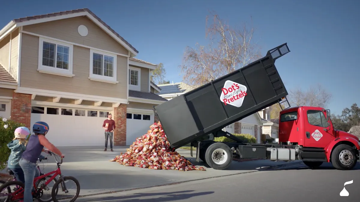 Truck unloading Dot's Pretzel in-front of house