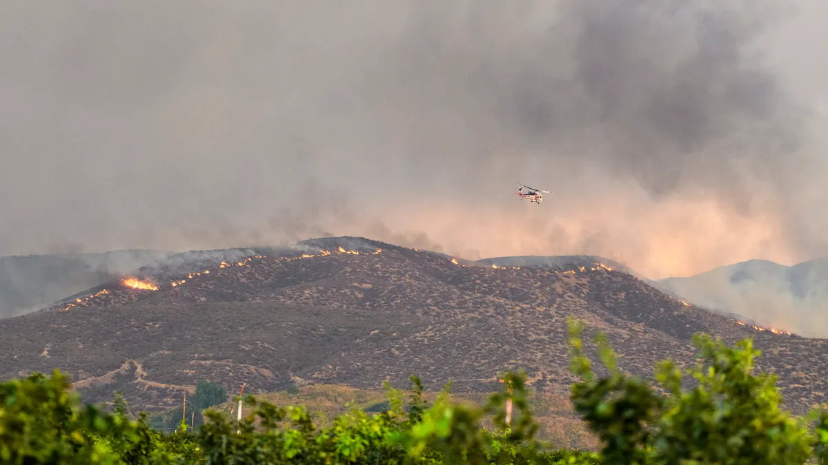 Background image of large smoke from wildfire