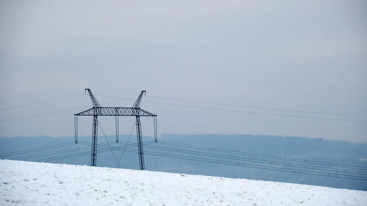 High voltage electric tower and power lines.