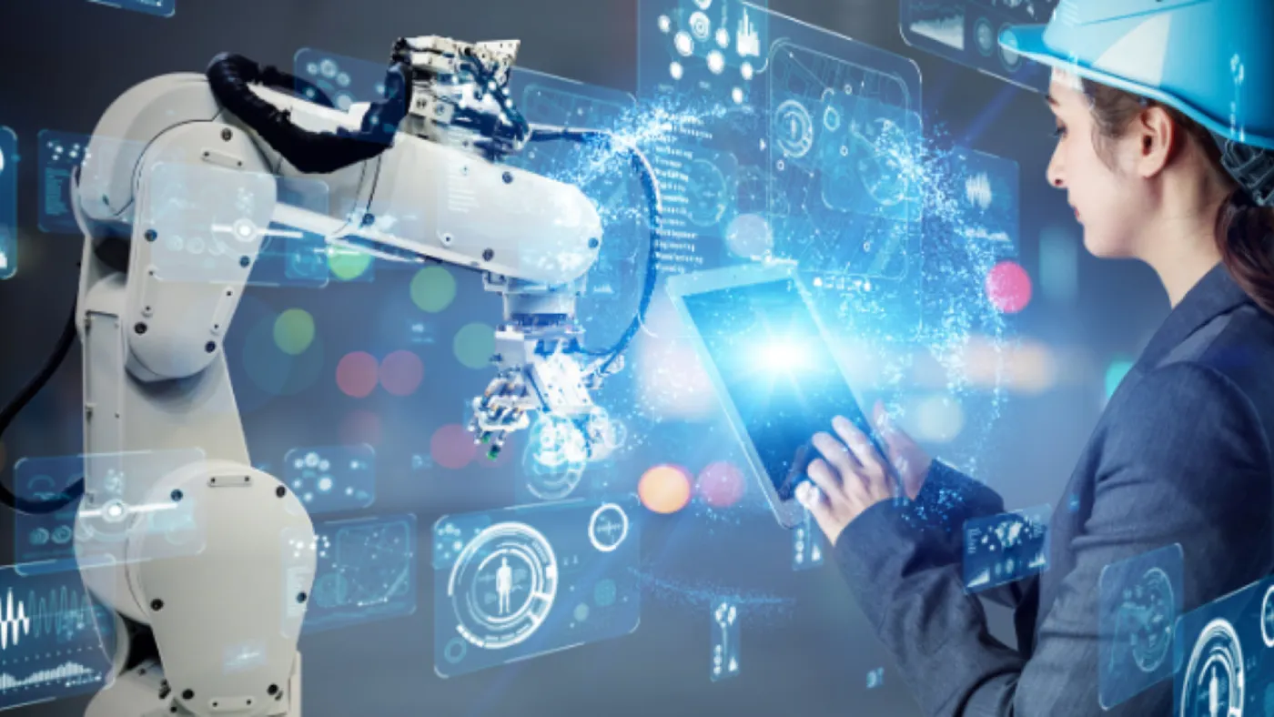 Engineer working on automated operations machine