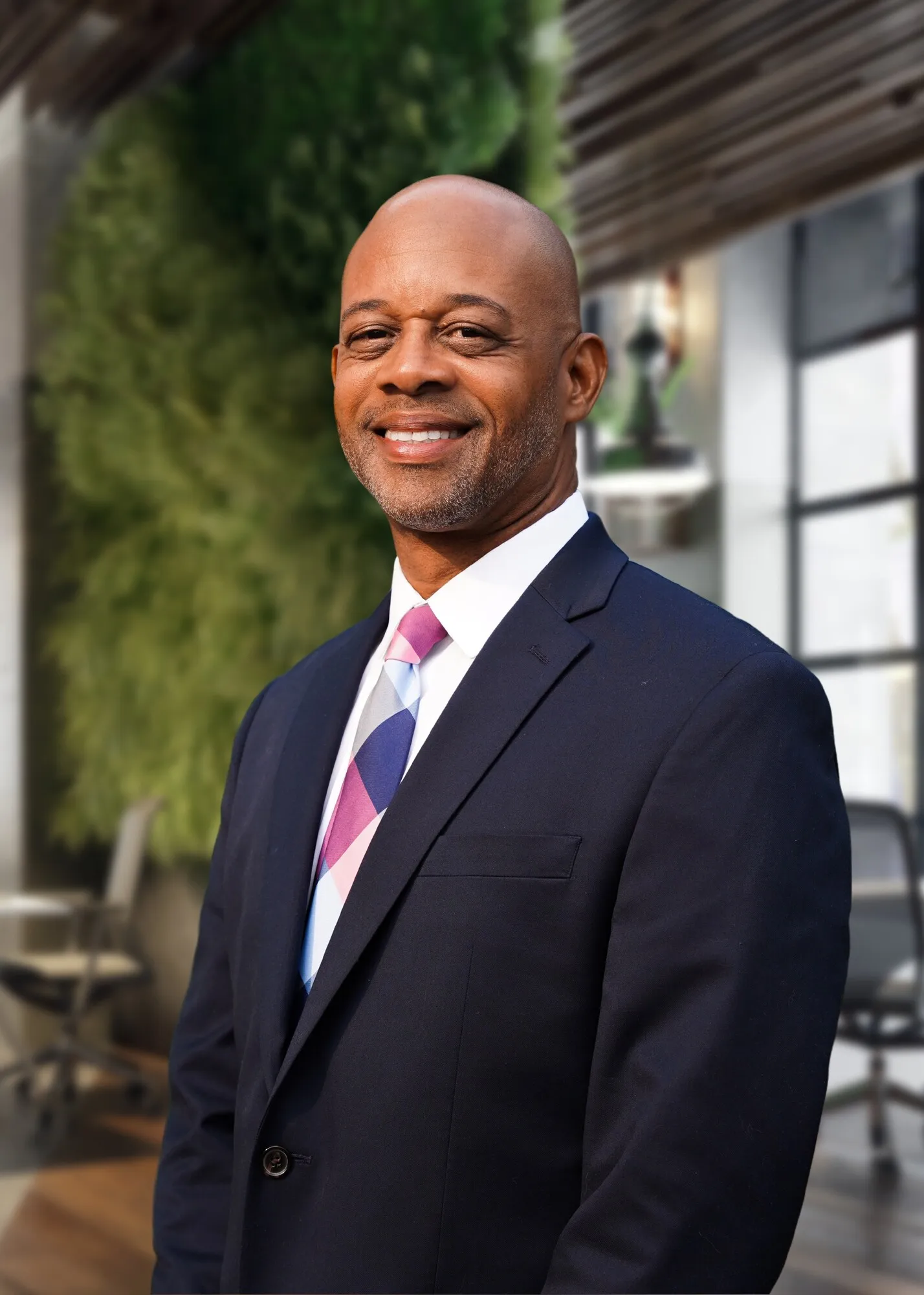 Headshot of man in suit