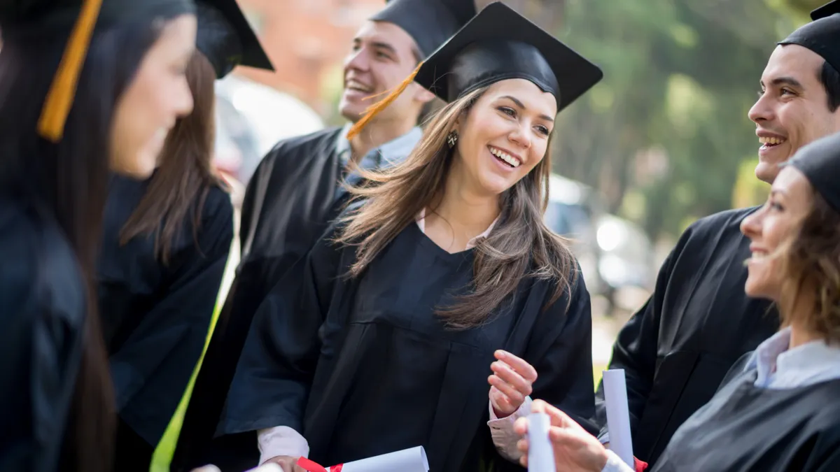 Group of graduation students looking very happy.