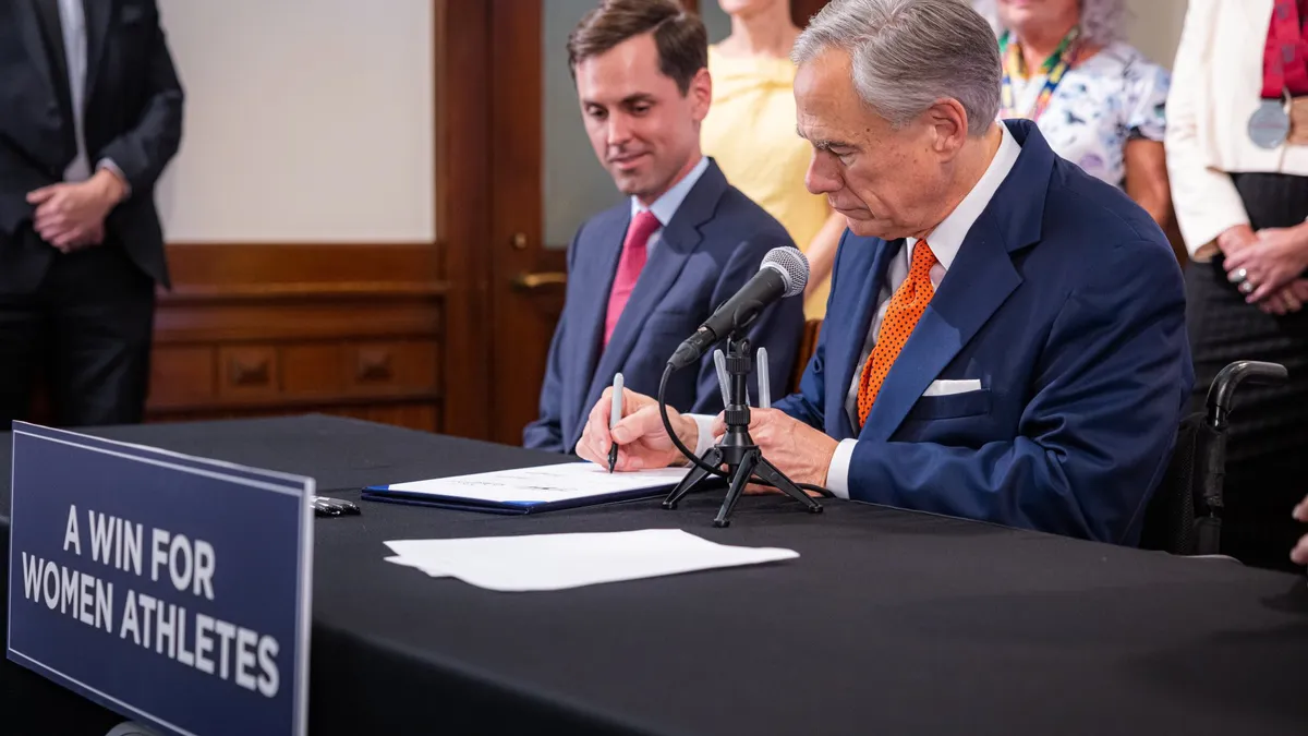 Texas Gov. Greg Abbott signs a bill