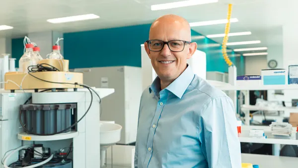 Neil Miller, CEO of NRG Therapeutics, in a laboratory.