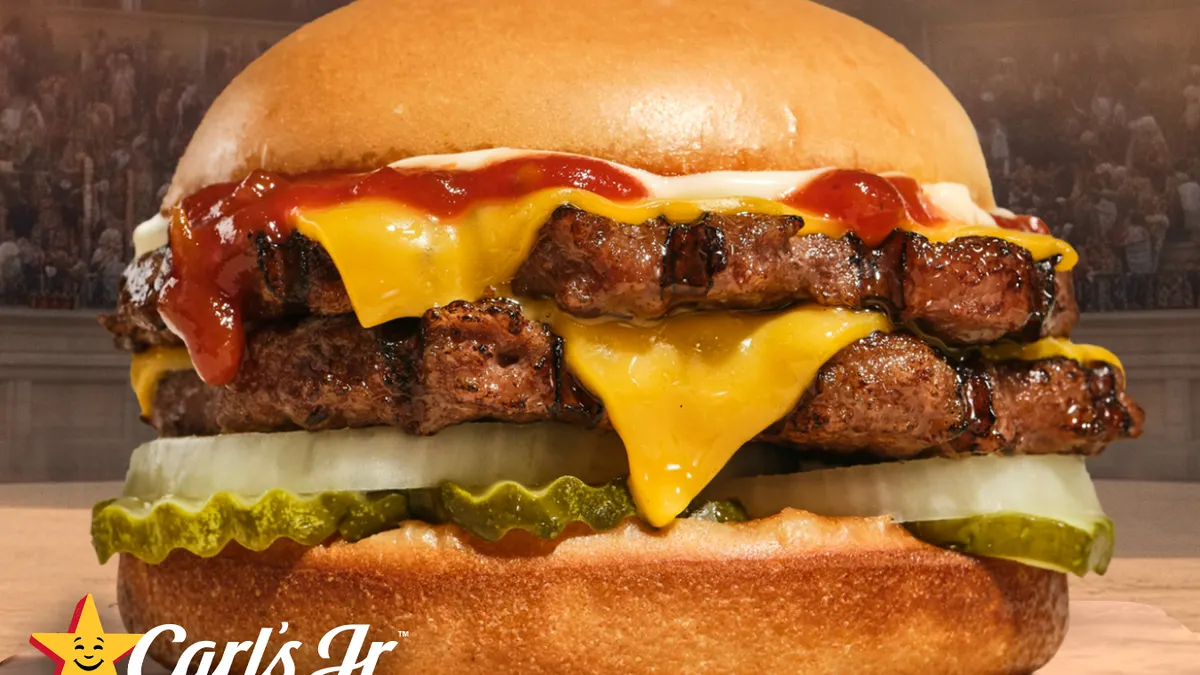 A close up shot of a burger with two patties.
