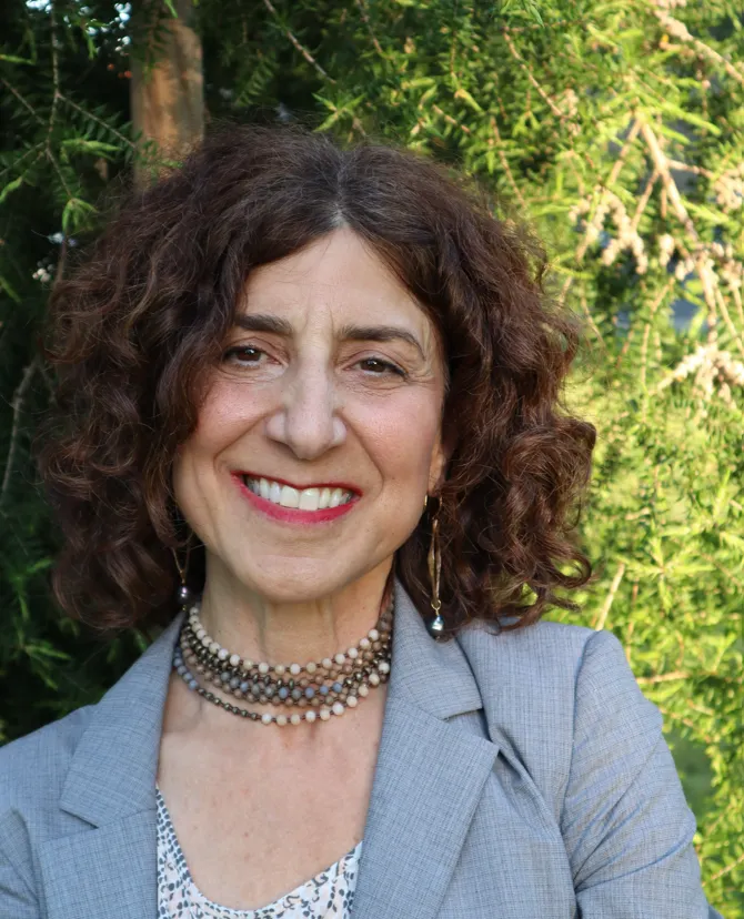 Lori Varlotta smiling for headshot.