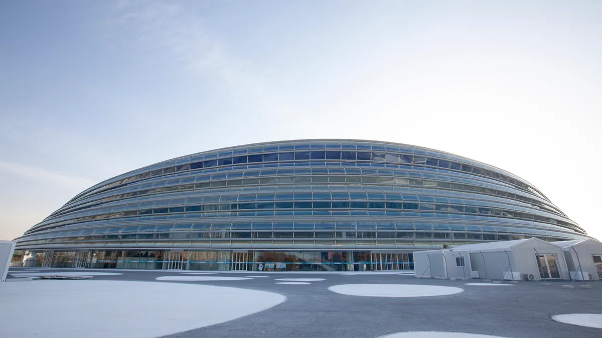 An outside shot of the National Speed Skating Oval in Beijing, China.