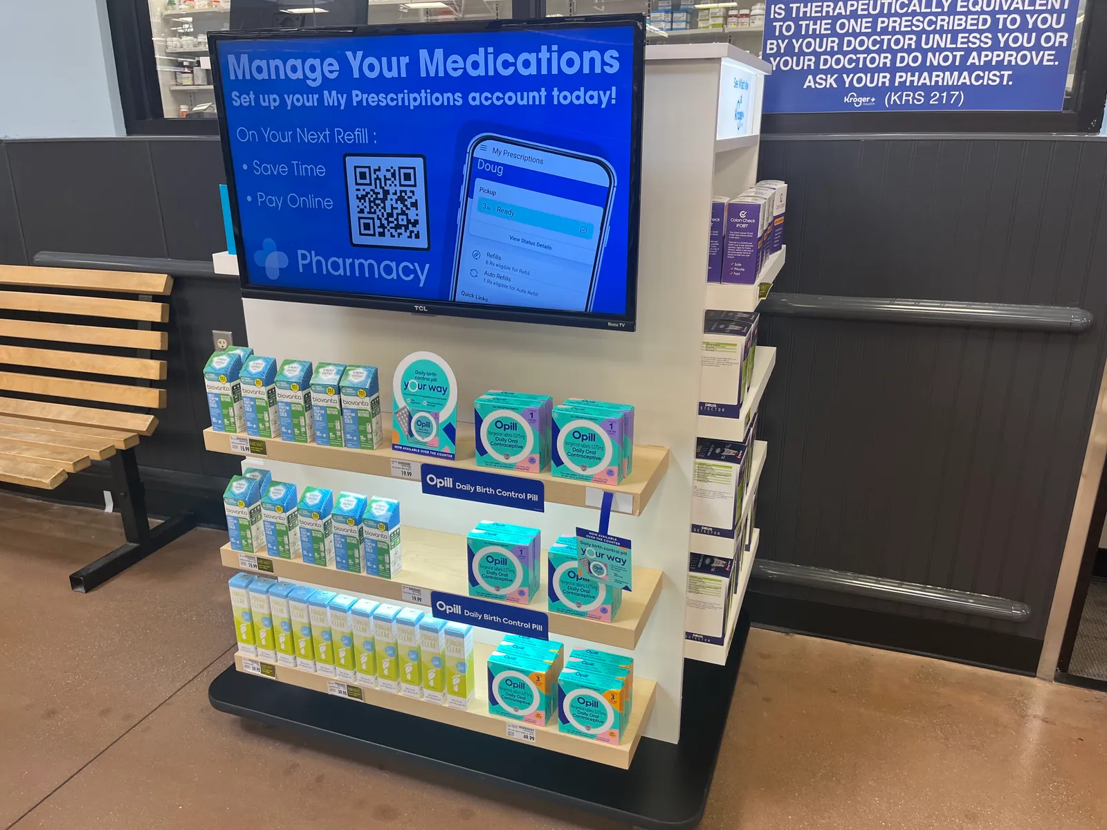 A digital screen at an in-store pharmacy.