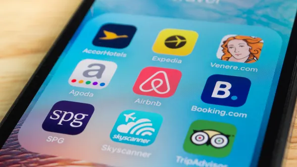 An phone screen with the Expedia icon.