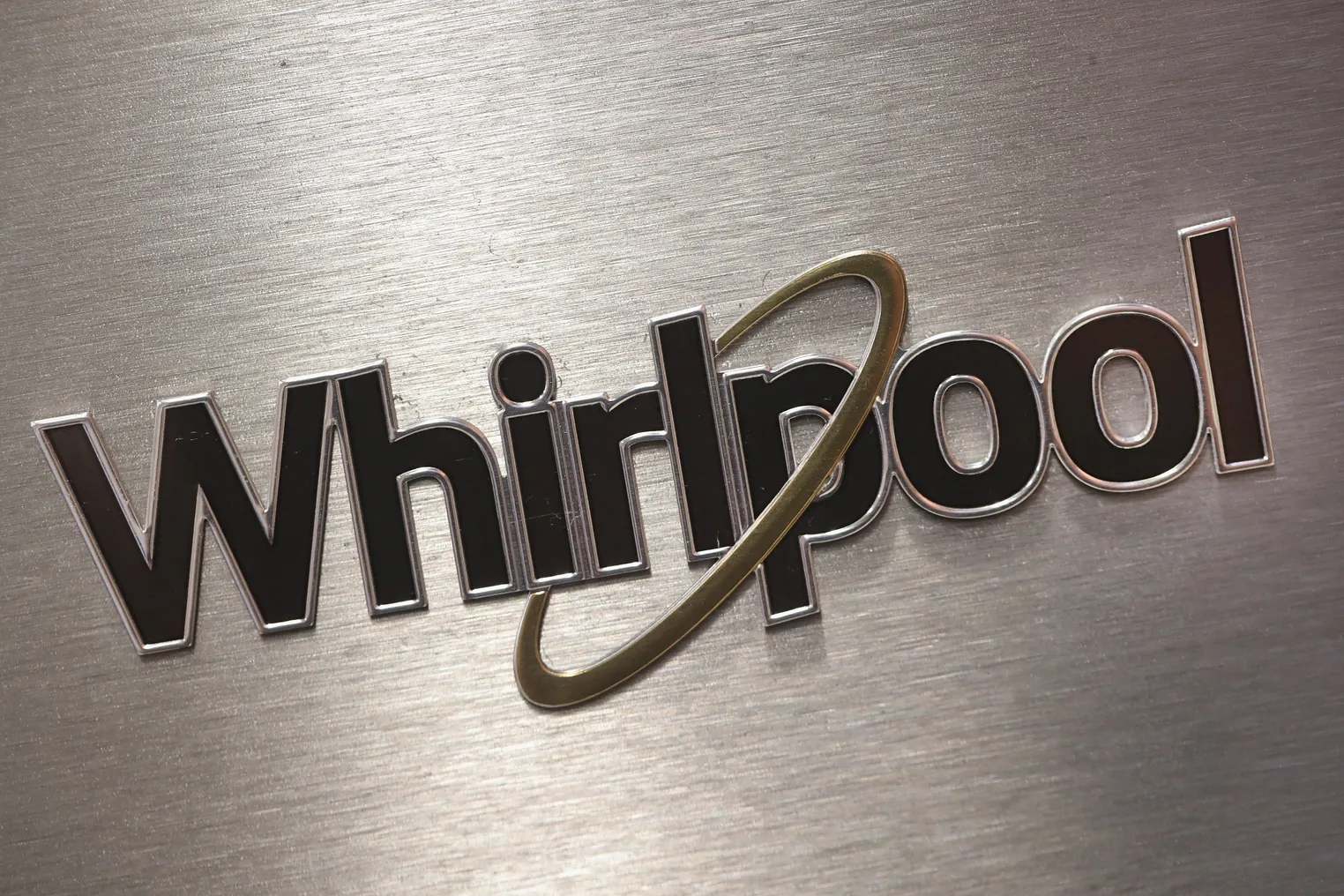 The Whirlpool logo on a home appliance product.